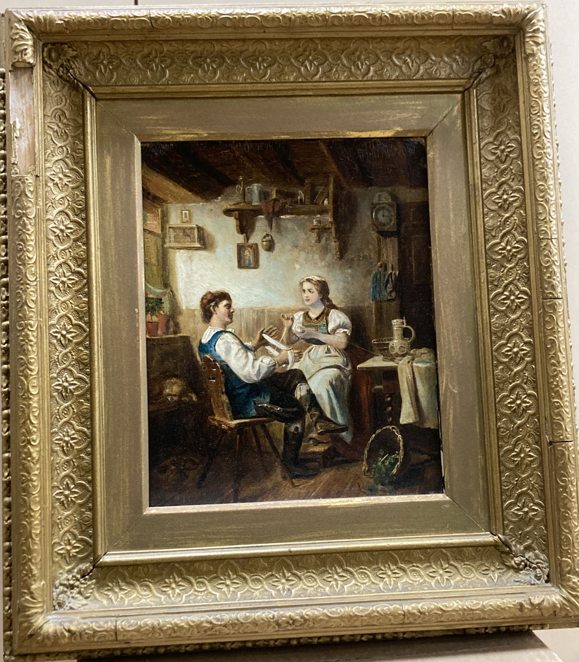 A Victorian overpainted print of interior with lovers, 24 x 20cm